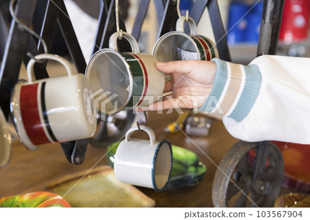 Young woman hand shopping at general store 103567904