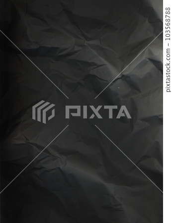 Creased paper texture. Aged overlay. Old film effect. Black worn surface with dust scratches wrinkles on dark illustration grunge abstract background. Creased paper texture. Aged overlay. Old film effect. Black worn surface with dust scratches wrinkles on dark illustration grunge abstract background. 103568788