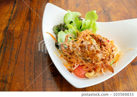 Papaya salad with crab on top, famous Thai food, Thai Salad, "Somtum" cuisine Papaya salad with crab on top, famous Thai food, Thai Salad, "Somtum" cuisine 103569833