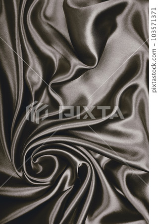 Smooth elegant silk or satin as background. In Sepia toned. Retro style Smooth elegant silk or satin as background. In Sepia toned. Retro style 103571371