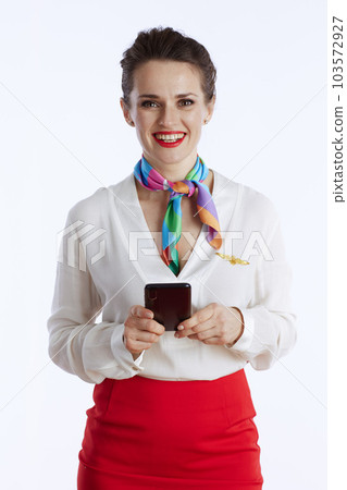 smiling elegant female stewardess on using phone 103572927