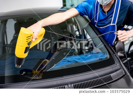 Car front windscreen film removal and tinting installation 103575029