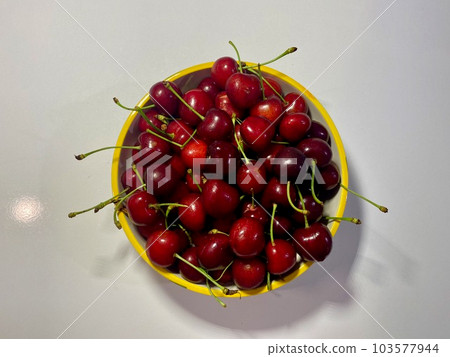 Turkish cherries on the plate 103577944