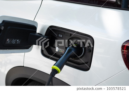Charging station for a car close-up. Green energy, environmentally friendly car. 103578521