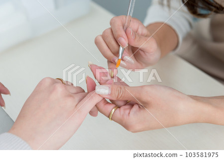 Nail salon treatment scene Nail salon treatment scene 103581975