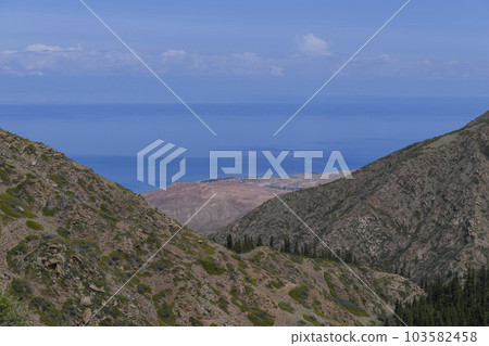 Issyk-Kul - lake in Kyrgyzstan. Summer mountain landscape. Kyrgyzstan mountains. 103582458