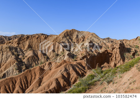 Canyon in Kyrgyzstan. Multi-colored canyon Fairy Tale. Kyrgyzstan mountains. Issyk-Kul region. Charyn Canyon. 103582474