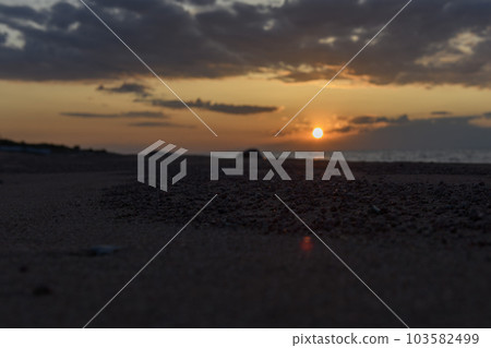 Issyk-Kul - lake in Kyrgyzstan. Summer mountain landscape. Kyrgyzstan mountains. Sunset. 103582499