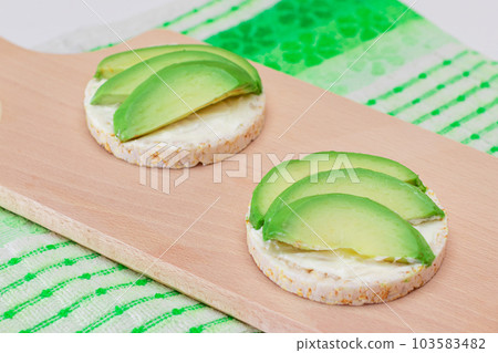 Rice Cake Sandwiches with Fresh Avocado and Cream Cheese 103583482