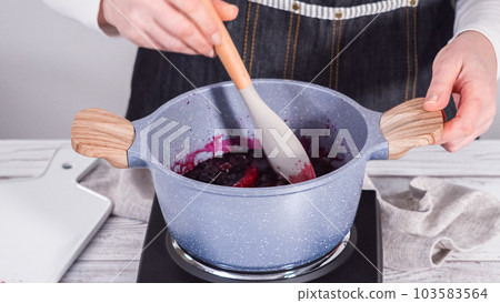 Step by step. Preparing mixed berry compote from frozen berries in a nonstick cooking pot. Step by step. Preparing mixed berry compote from frozen berries in a nonstick cooking pot. 103583564