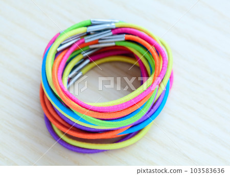 Colored rubber bands 103583636