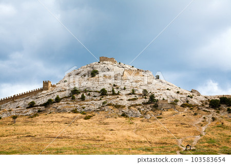 Genoese fortress in Sudak. Evening view. 103583654
