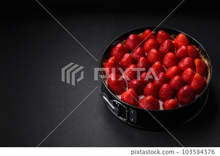 Delicious sweet cake or cheesecake with mascarpone cheese and strawberries 103584376
