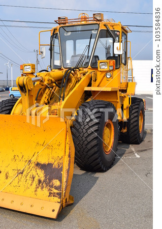 Snowplow waiting in a snowy country Snowplow waiting in a snowy country 103584836