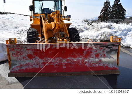 Snowplow waiting in a snowy country Snowplow waiting in a snowy country 103584837