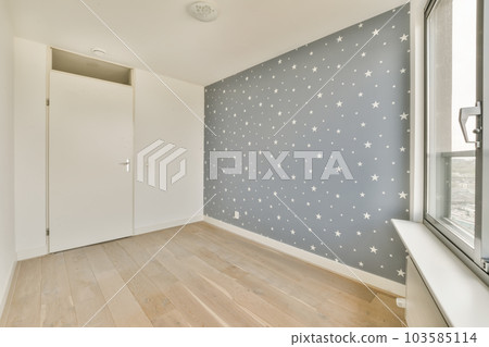 an empty room with stars on the wall and wood flooring in front of the window, looking out onto the street an empty room with stars on the wall and wood flooring in front of the window, looking out onto the street 103585114