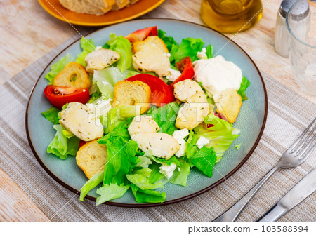Popular dish of american cuisine is Caesar salad 103588394