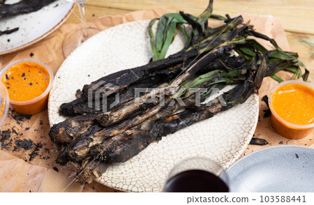 Delicious fried kalsot served with sauce 103588441