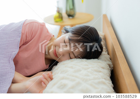 The woman in the bedroom The woman in the bedroom 103588529