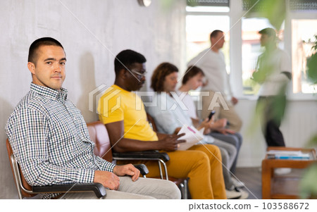 Man waiting for consultation in lobby of notary office Man waiting for consultation in lobby of notary office 103588672