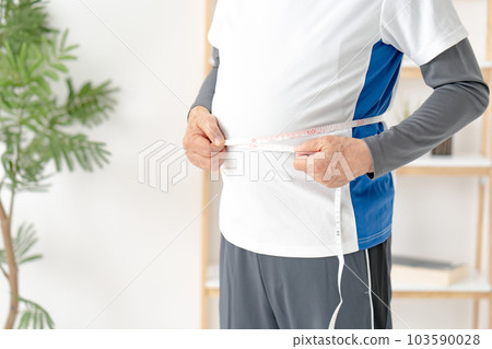 Senior man sportswear diet stomach hand 103590028