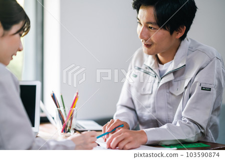 Male engineer making corrections to the development plan Male engineer making corrections to the development plan 103590874