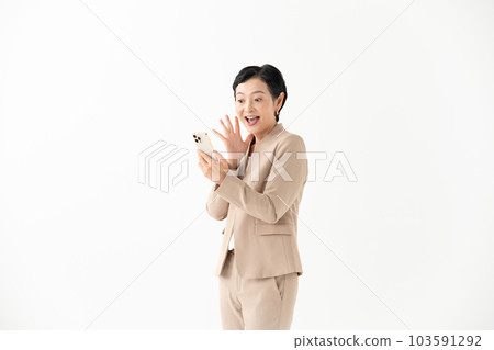 A woman watching smartphone 103591292