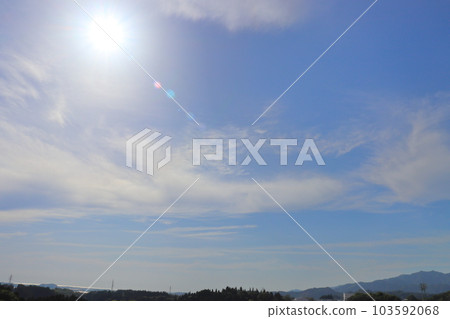 Blue sky, clouds, sun, mountains 103592068