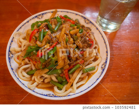 [Japan] Noodle dish ragmen and a glass of water ordered at a Uyghur restaurant in Tokyo 103592481