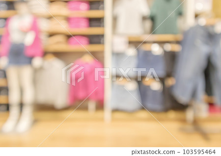 modern clothing store interior blur abstract defocused background with bokeh light modern clothing store interior blur abstract defocused background with bokeh light 103595464