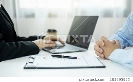 HR Manager talks to job applicants for job interviews about careers and Her personal history in the company. Employment and Recruitment concepts 103595935