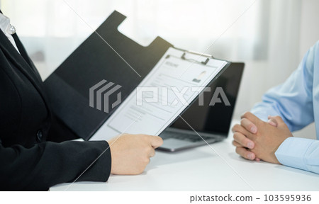 Businesswoman HR Managers people hold a resume and talk to job applicants for job interviews about careers and Their personal history in the company. Employment and Recruitment concepts 103595936