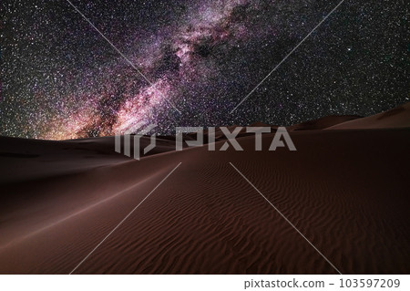 Amazing views of the Sahara desert under the night starry sky. Amazing views of the Sahara desert under the night starry sky. 103597209