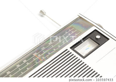 Old transistor radio isolated on white rear view. 103597433