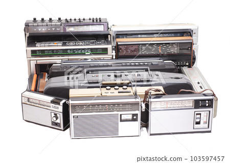 Collection of old tape recorders and transistor radio 103597457