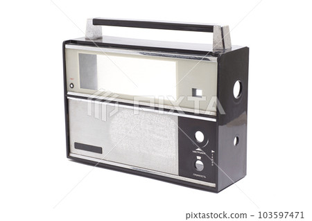 Old empty disassembled transistor radio isolated on white. 103597471