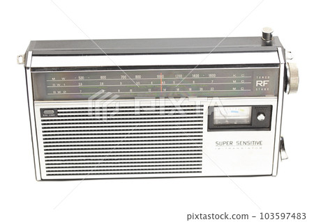 Old transistor radio isolated on white Old transistor radio isolated on white 103597483