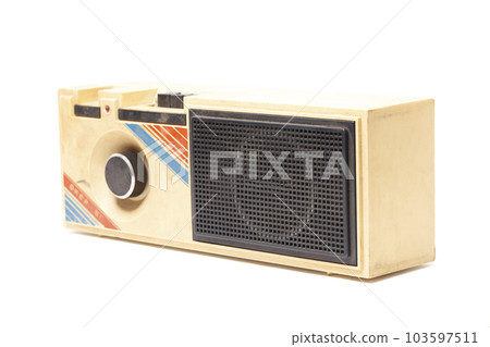 Old transistor radio isolated on white. Old transistor radio isolated on white. 103597511