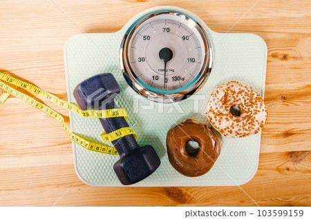 Scale for measuring weight after exercise in the gym 103599159