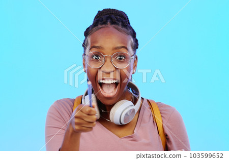 Wow, thinking and aha with a black woman in studio on a blue background looking thoughtful or surprised. Idea, wonder and eureka with an attractive young female feeling shocked or contemplative 103599652