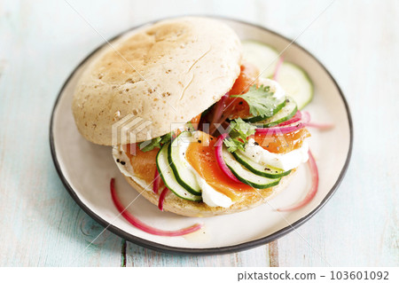 Smoked salmon sandwich with cucumber and cream cheese. Smoked salmon sandwich with cucumber and cream cheese. 103601092