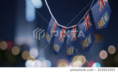 A garland of Falkland Islands national flags on an abstract blurred background A garland of Falkland Islands national flags on an abstract blurred background 103601893
