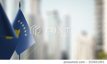 Small flags of the Kosovo on an abstract blurry background Small flags of the Kosovo on an abstract blurry background 103601901