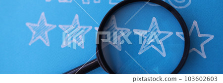 Five stars feedback rate us on blue background with magnifier Five stars feedback rate us on blue background with magnifier 103602603