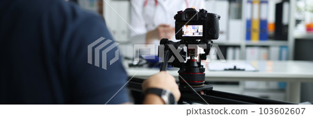 Operator removes doctor medical consultation on camera 103602607