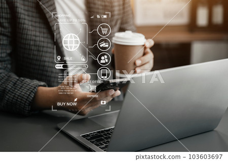 Business hand using smart phone, mobile p payments online shopping, omni channel, digital laptop computer. 103603697