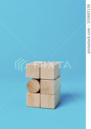 cylindrical toy block among rectangular toy blocks cylindrical toy block among rectangular toy blocks 103605136
