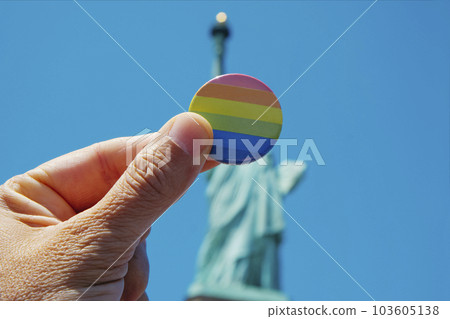 rainbow badge in front of Statue of Liberty 103605138