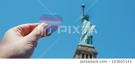 transgender flag in front of the Liberty, banner 103605141