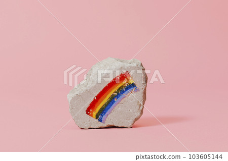 rainbow flag on a rock 103605144